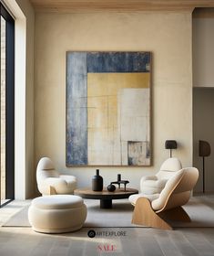 a living room with two white chairs and a coffee table in front of a painting