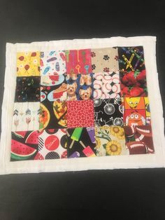 a piece of cloth with many different designs on it