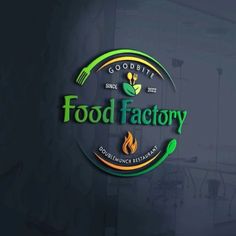 the food factory logo is displayed on a dark background with green leaves and spoons