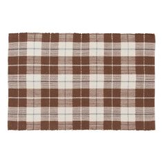 a brown and white plaid rug on a white background