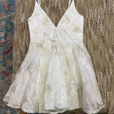 Short White Dress With Gold Accents White And Gold Dress Short, White And Gold Dress Short Long Sleeve, White And Gold Dress Short Tight, White And Gold Mini Dress, Chic White Mini-length Boho Dress, Fitted Bohemian Off-white Mini Dress, Gold Dress Short, White Gold Dress, White Short Dress