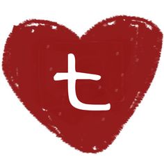 a red heart with the letter t painted on it's side in white ink