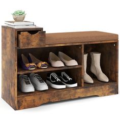 several pairs of shoes are lined up on a shelf