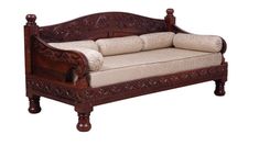 a wooden couch with white cushions on it