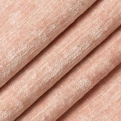 a close up shot of the fabric in light pink