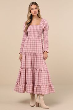 If playful perfection is your vibe, look no further than the Sister Jane Pointe Check Pink Plaid Smocked Tiered Long Sleeve Midi Dress! Midweight woven fabric boasts a plaid, checkered design as it shapes long, Juliet-style sleeves with ruffled cuffs, smocked forearms, and adorable puffed shoulders with elastic. Square neckline tops a fitted, smocked bodice with a high waist. Skirt has a tiered silhouette that falls to a long midi hem. Fit: This garment fits true to size. Length: Mid-calf length. Size uk m/us 6 measures 51" from shoulder to hem. Bust: Great for any cup size. Waist: Fitted - elastic waist allows stretch. Hip: Not Fitted - fuller skirt allows room for hips. Undergarments: May be worn with a strapless bra, adhesive bra, petals, or no bra. Fabric: Fabric has no stretch. Unline Pink Winter Dresses, Sister Jane, Checker Design, Checkered Design, Long Midi, High Waist Skirt, Sleeve Midi Dress, Long Sleeve Midi, Pink Plaid