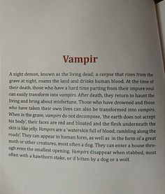 an open book with the words vampire written in red and black on it's page