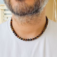 Welcome to Our Store ❤💕 ►►If you are looking for a Everyday Tiger Eye Brown Choker Necklace, this product is for you! ► Necklace ; Made of 8mm Tiger Eye beads. ► When You Get The Necklace, I Will Have Sent You A Gift Bracelet. ►Our necklace and bracelet (with elastic) is Adjustable Necklace.  ►► Who can buy this product? ► A great option for those looking for brown necklaces! ► A great option for those looking for a Tiger Eye necklace! ► Perfect choice for protection necklace lovers! ► A great Brown Beaded Necklaces As Gifts, Brown 8mm Beads Necklace For Gift, Brown Necklaces, Brown Choker, Tiger Eye Necklace, Brown Beaded Necklace, Tigers Eye Necklace, Gift Bracelet, Brown Necklace