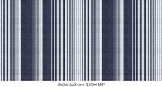 a blue and white striped wallpaper with vertical stripes in the center, as well as horizontal lines