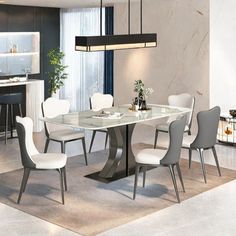 a dining room table with white chairs and a bar in the back drop off cabinet