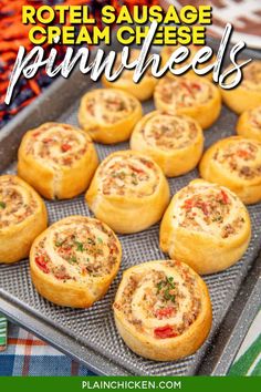 mini pizzas on a pan with text overlay that reads roti sausage cream cheese pinwheels