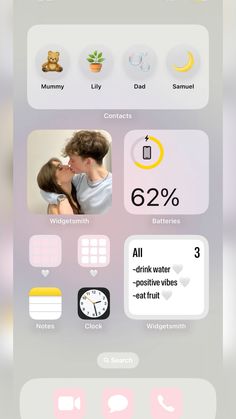 an iphone screen with icons and text on the bottom right corner, including two people kissing each other