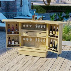 an outdoor bar with bottles and glasses on it