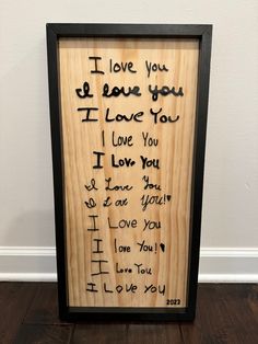 a wooden sign with writing on it that says, i love you and i love you