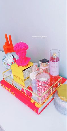 an assortment of beauty products on a tray