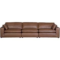 a brown leather couch with two pillows on it's back and one arm facing the camera