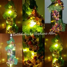 bottles with lights in them are decorated with grapes