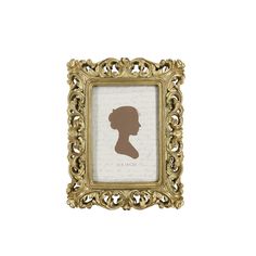 a gold frame with a silhouette of a woman's head in the center, on a white background