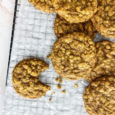 some cookies are sitting on a cooling rack