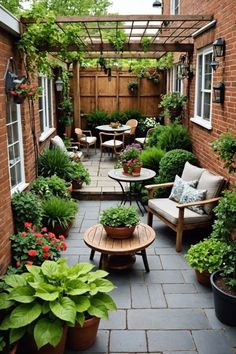 an outdoor patio with potted plants and seating