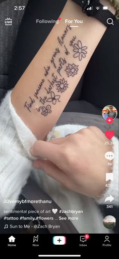 someone has written on their arm with flowers