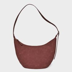 Bring a chic finishing touch to your everyday or dressy outfits with this Slouchy Crescent Sling Handbag from Universal Thread™. This unstructured handbag features a single zipper compartment to carry your phone, wallet, makeup essentials and other items. Plus, it has an interior zip pocket for any additional space you need. Designed in crescent shape and featuring a faux-suede finish in a solid hue, this handbag features an adjustable belt strap that make carrying it convenient and comfortable. Versatile Hobo Bag With Cell Phone Pocket, Versatile Hobo Shoulder Bag With Cell Phone Pocket, Hobo Bag With Cell Phone Pocket For On-the-go, Chic Everyday Hobo Bag With Cell Phone Pocket, Chic Hobo Bag With Cell Phone Pocket, Chic Hobo Bag With Cell Phone Pocket For Travel, Modern Bag With Cell Phone Pocket, Chic Hobo Crossbody Bag With Cell Phone Pocket, Chic Crossbody Hobo Bag With Cell Phone Pocket