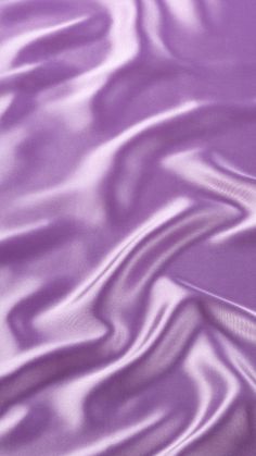 a purple background with wavy lines