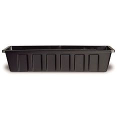 a black plastic planter on a white background