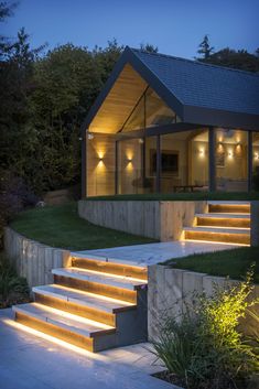 some steps lit up in front of a house