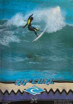 a man riding a surfboard on top of a wave in the ocean with blue water