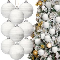 a christmas tree with white balls hanging from it