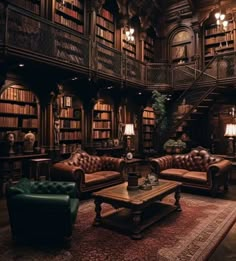 a living room filled with lots of furniture and bookshelves in front of a spiral staircase