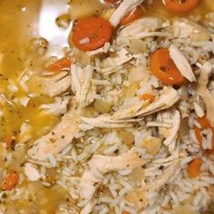 chicken and rice with carrots in a pot