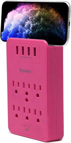 an iphone is plugged into a pink charger with the charging station attached to it