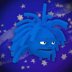 a blue cartoon character with stars around it