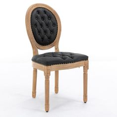 a wooden chair with black fabric seat padding and wood frame, on a white background