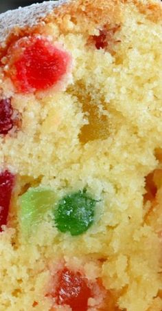 a close up of a piece of cake with jelly candies on the top and bottom