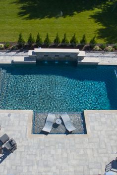 StoneScapes Regular Black | NPT Pool Finishes Pool With Tanning Ledge, Raised Pools, Tanning Ledge Pool, Inground Pool Designs, Rectangle Pool, Black Pool, Dream Backyard Pool, Pool Finishes, Outdoor Pool Area