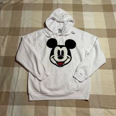 Nwt. Measurements In Photos. Product Info: Bring Back Those Memories With This Disney Mickey Mouse Hoodie. The Crocheted Design Makes It The Perfect Gift For Women Everywhere. Whether It Be For And Achievement, Halloween, Christmas Or A Birthday. Long Sleeves And A Classic Crew Cut Neck Make This Comfortable Graphic Tee, One Women Will Love To Wear. Disney Cotton Sweatshirt For Winter, White Disney Cotton Sweatshirt, Winter Disney Cotton Sweatshirt, Mickey Mouse Hoodie For Winter, Winter Hooded Mickey Mouse Sweatshirt, Mickey Mouse Sweatshirt For Winter Streetwear, Mickey Mouse Hooded Tops For Winter, Casual Mickey Mouse Sweatshirt For Winter, Mickey Mouse Cotton Hoodie For Winter