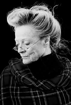 black and white photograph of an older woman with glasses