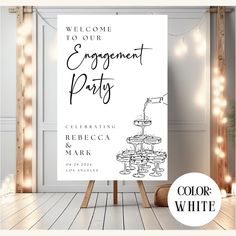 a welcome sign for an engagement party