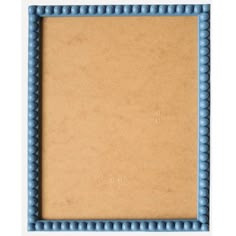 an old photo frame with blue beading around the edges on a white background for text or image