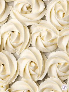 some white icing that is in the shape of roses