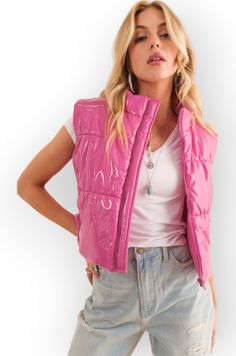 Hey there, fashionista! Get ready to elevate your outerwear game with our Cozy Up Quilted Puffer Zip Crop Vest . This stylish and trendy piece is a must-have addition to your wardrobe. With a shiny finish, this vest exudes a sleek and modern look that is sure to turn heads. The quilted design not only adds a fashionable texture but also provides warmth for those chilly days. With its cropped length and sleeveless design, this vest offers versatility, allowing you to layer it over various outfits Core Outfits, Chic Quilts, Crop Vest, Nostalgia Core, Trendy Outerwear, Womens Puffer Vest, Quilted Puffer Vest, Hannah Montana, Cropped Vest