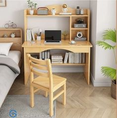 a bedroom with a bed, desk and computer on the shelf in front of it