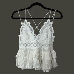 Nwt Free People Adella Cami Top White Women Small Crochet And Lace With Lined Cups Peplum With Tons Of Ruffles Adjustable Straps Smocked Back Lots Of Stretch Bust 13" Length 17" 69% Viscose 19% Nylon 12% Cotton In Excellent Condition Smoke Free Home Fitted Ruffle Crochet Top, Spring Fitted Lace Top With Ruffles, Lace Tops With Ruffles, Fitted Ruffled Lace Top For Spring, Chic Sleeveless Crochet Top With Ruffles, White Sleeveless Lace Top With Ruffles, White Lace Top With Ruffles For Spring, Spring Beach Crochet Top With Ruffles, Fitted Peplum Tops With Lace Trim