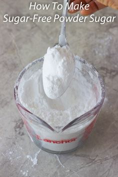 sugar - free powdered sugar being spooned into a measuring cup with the title how to make sugar - free powder sugar