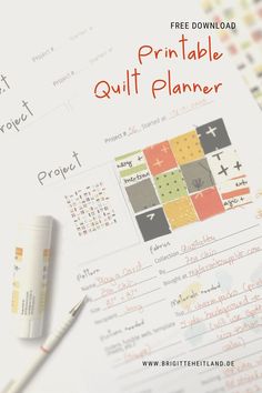 the printable quilt planner is sitting on top of a table next to a pen