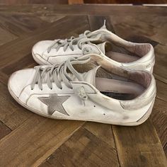 These Golden Goose Sneakers Are In Good Used Condition. Size 39 In White, Grey And Silver. I Wear Between An 8.5-9 And This Fit Well. They Show Some Signs Of Wear But With The Golden Goose Look These Stay True To The Style. They Have A Lot Of Life Left In Them. The Golden Goose, Golden Goose Superstar, Goose Sneakers, Golden Goose Sneakers, Stay True, Golden Goose, White Silver, The Golden, Womens Shoes Sneakers