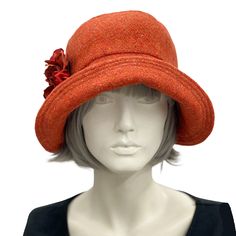 Cloche hat vintage style 20s ns 30s burnt orange wool hydrangea flower brooch close up brooch view Vintage Orange Hat With Curved Brim, Fitted Wide Brim Orange Hat, Fitted Orange Hat With Short Brim, Orange Fitted Hat With Short Brim, Elegant Orange Brimmed Hat, Elegant Orange Short Brim Hat, Orange Curved Brim Hat For Kentucky Derby, Orange Short Brim Hat For Kentucky Derby, Orange Flat Brim Hat